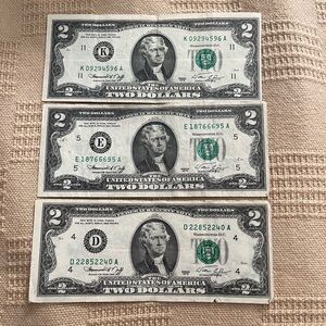 Set of Three US Two Dollar Bills - circulated - evaluated as rare.